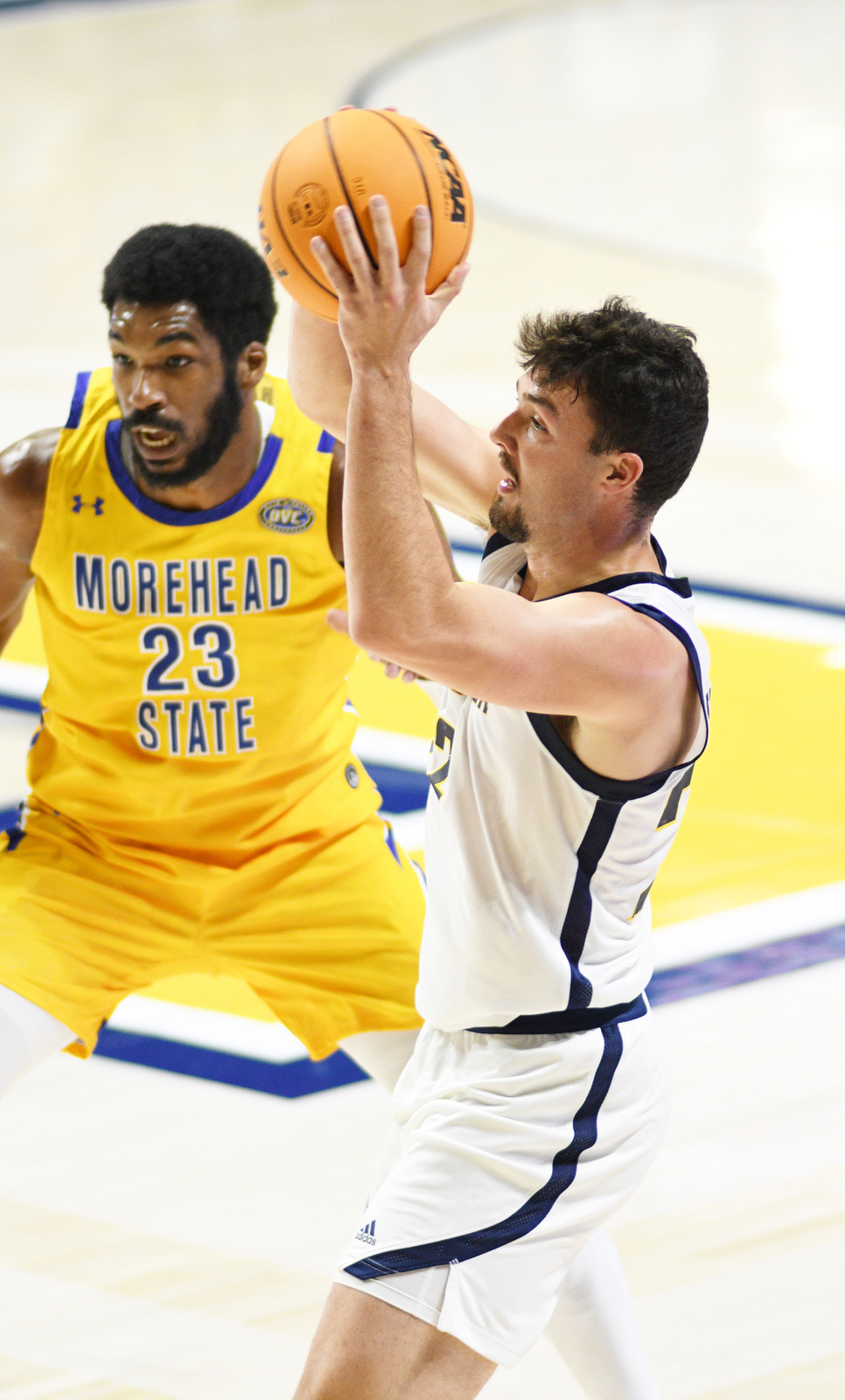 Staff Photo by Robin Rudd / UTC's Bash Wieland (22) looks for an open Moc. The University of Tennessee at Chattanooga Mocs hosted the Morehead State University Eagles in a men's basketball game on November 14, 2024.