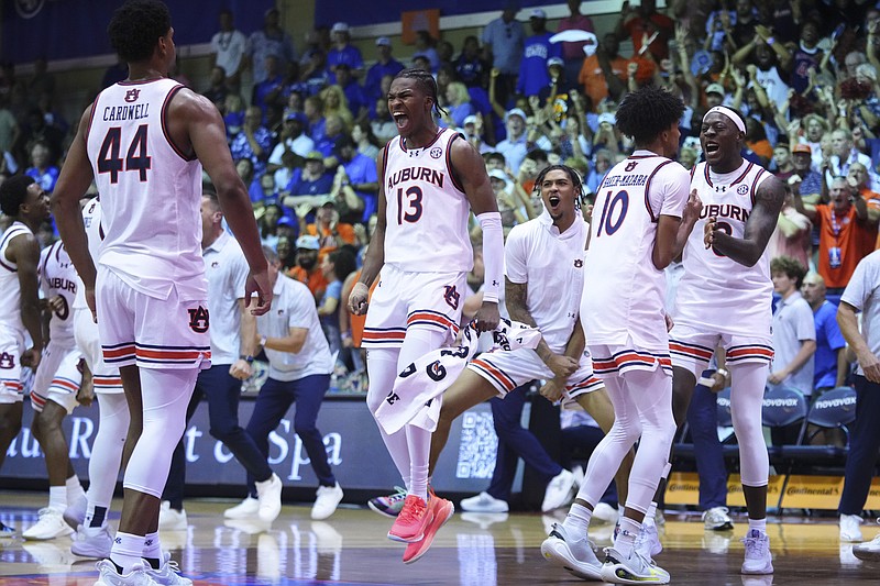 Kansas holds off Auburn for No. 1 in AP Top 25 as SEC grabs 3 of top 4