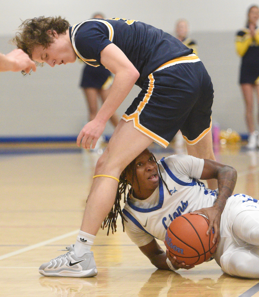 Staff photo by Matt Hamilton/ Red Bank (13) Micah Allen looks for an outlet after winning the ball against Walker Valley (55) Graham Campbell during their game at Red Bank High School on Tuesday, January 21, 2025.