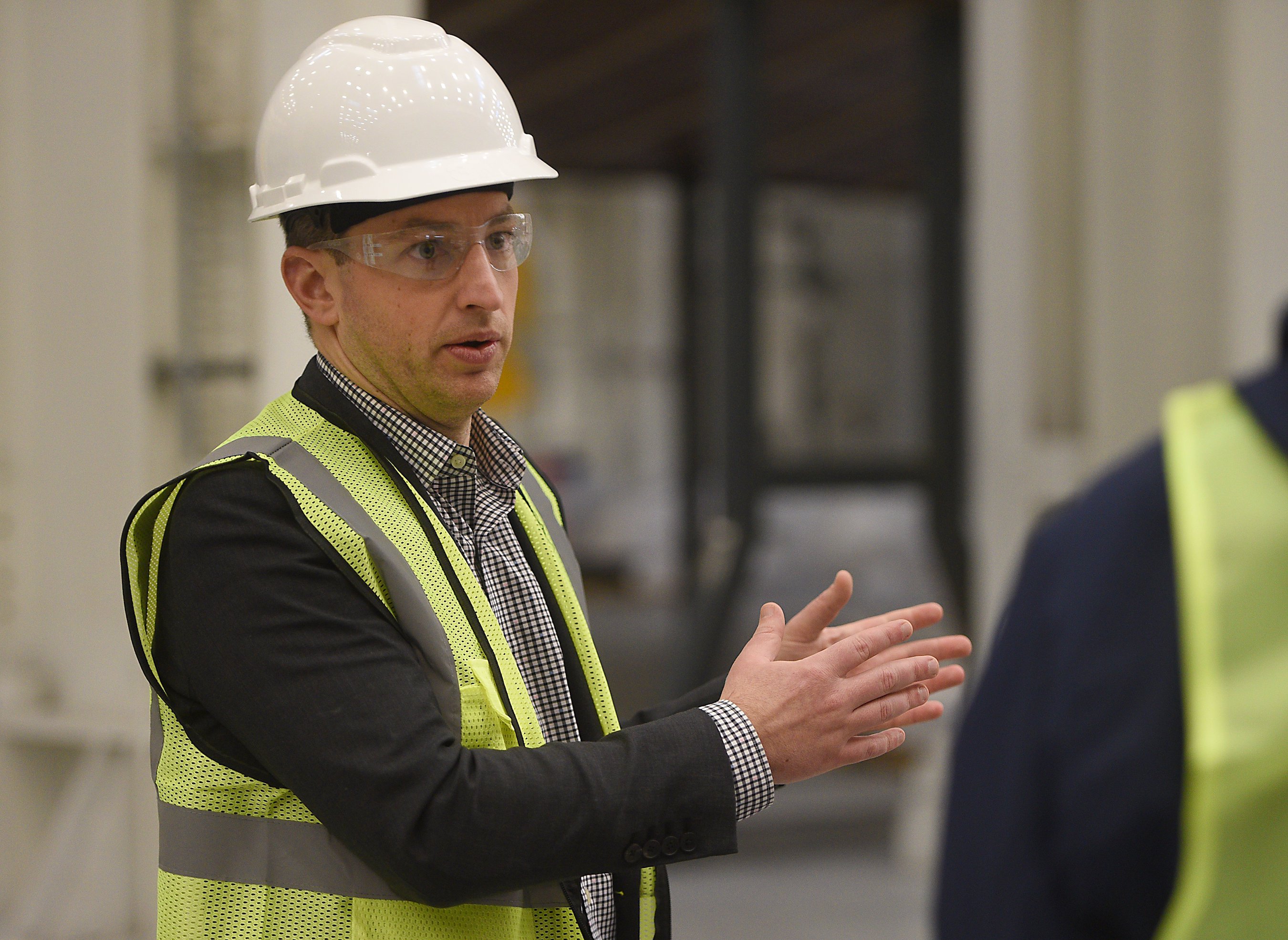 Staff photo by Matt Hamilton / Chris Burns, Novonix's departing CEO, talks about the company Dec. 5, 2024, at the Riverfront Parkway plant. Burns said commercial production is to start this year on synthetic graphite.