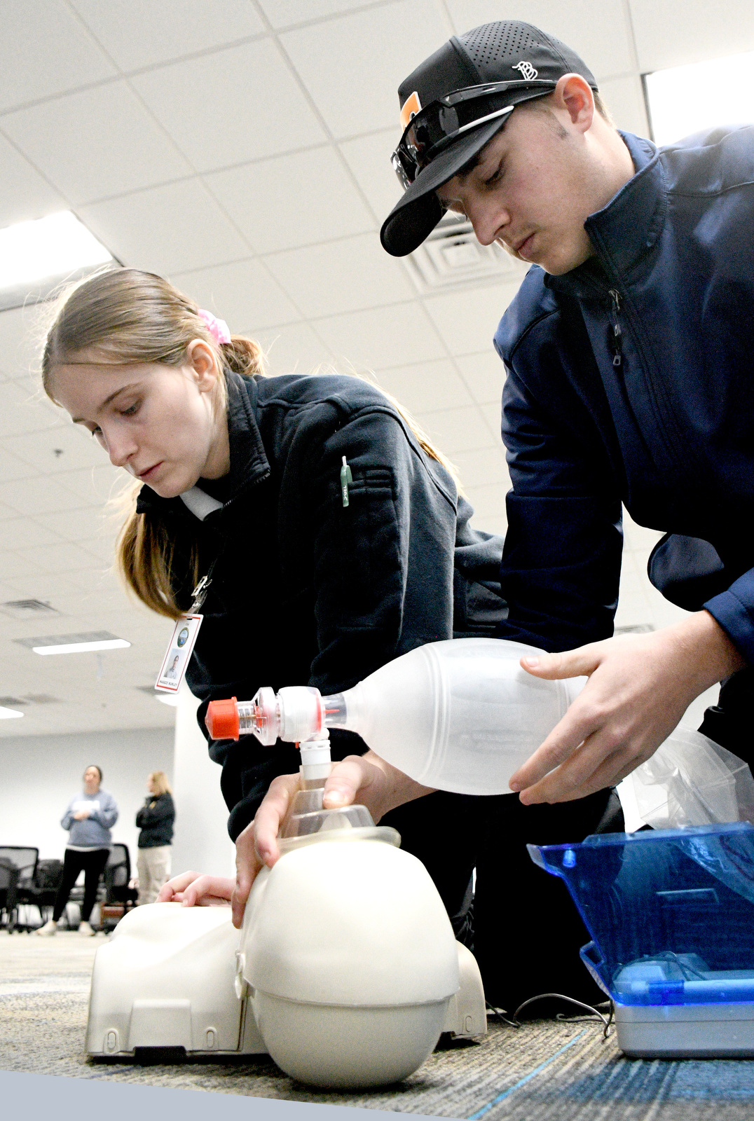 Staff Photo by Robin Rudd / From left, students, Maggie Nunley and Bradley Dowlen practice CPR with a training manikin Jan. 22, 2025. Starting this school year, Hixson High students can receive hands-on training at Hamilton County's EMS Training Center.
