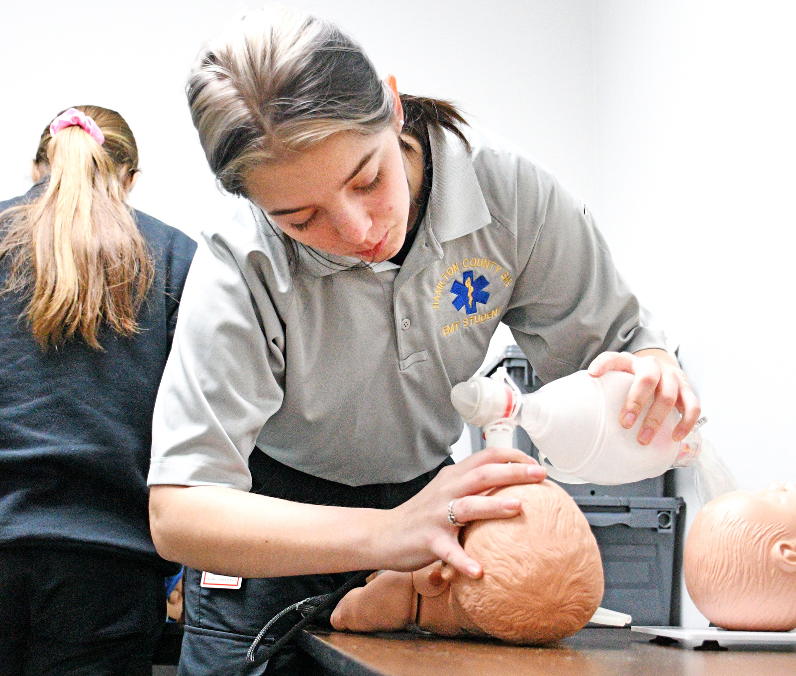 Staff Photo by Robin Rudd / Student Abigail Christensen practices opening an airway on a pediatric manikin Jan. 22, 2025. Starting this school year, Hixson High students can receive hands-on training at Hamilton County's EMS Training Center.