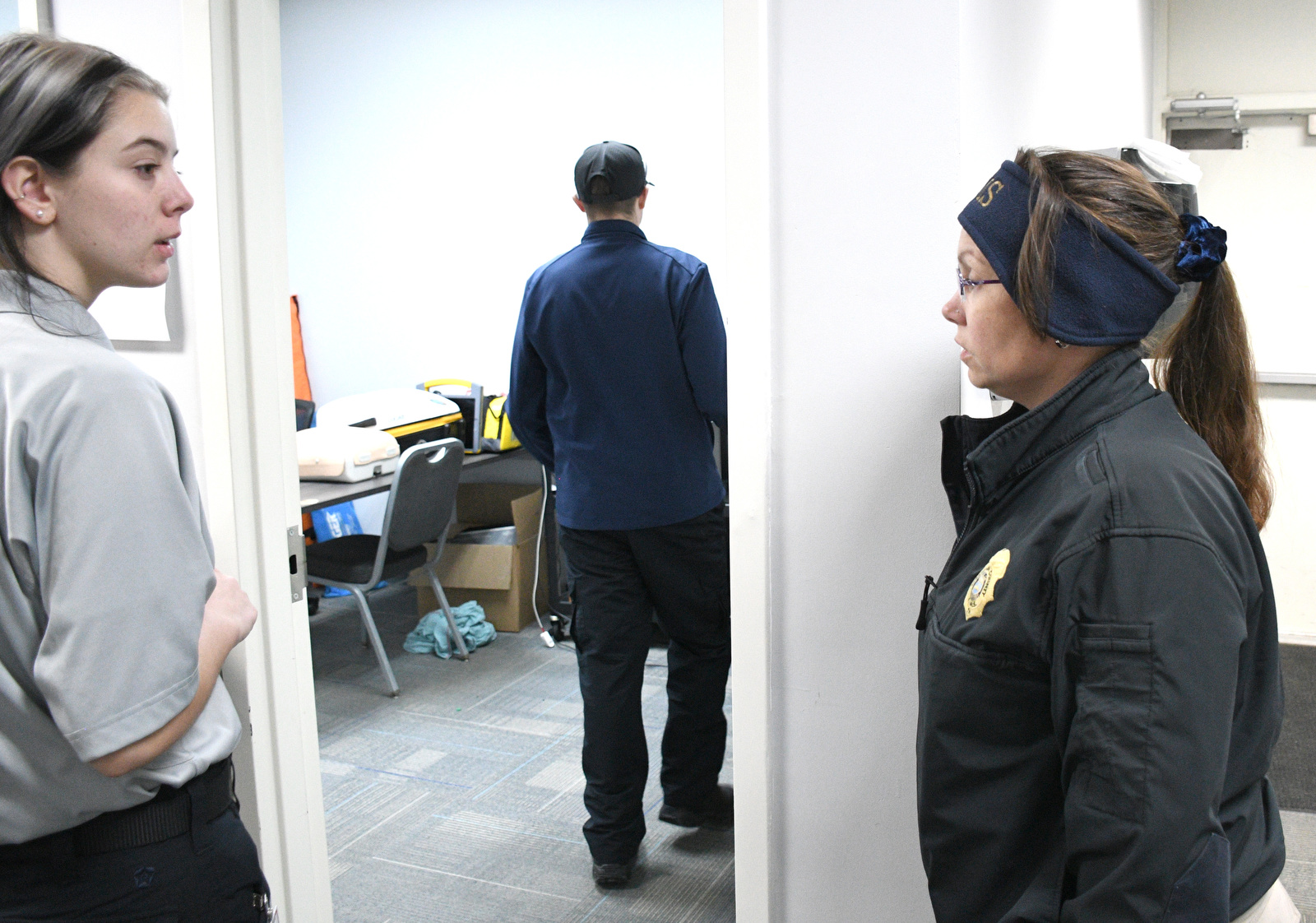 Staff Photo by Robin Rudd / Lt. Jamie Snevely, left, gives instructions Jan. 22, 2025, before a session on wound dressing. Starting this school year, Hixson High students can receive hands-on training at Hamilton County's EMS Training Center.