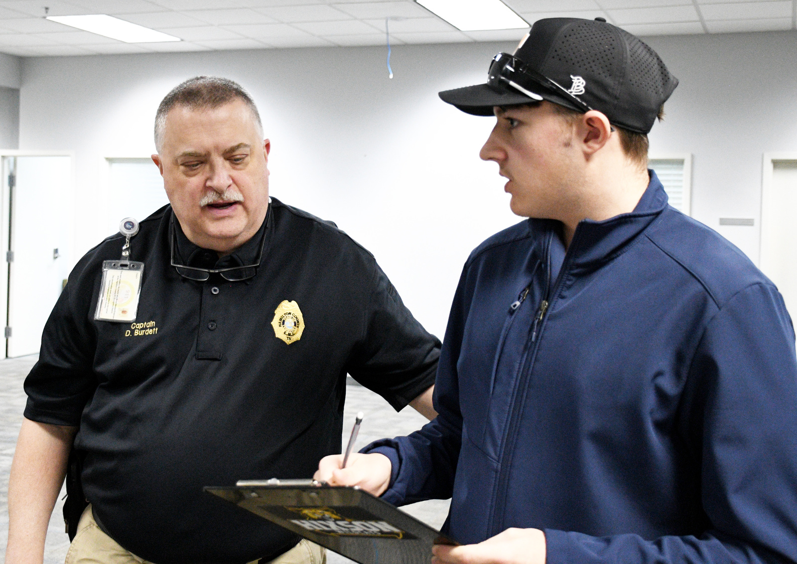 Staff Photo by Robin Rudd / EMS Training Supervisor Capt. David Burdett confers Jan. 22, 2025, with student Bradley Dowlen about a homework assignment. Starting this school year, Hixson High students can receive hands-on training at Hamilton County's EMS Training Center.
