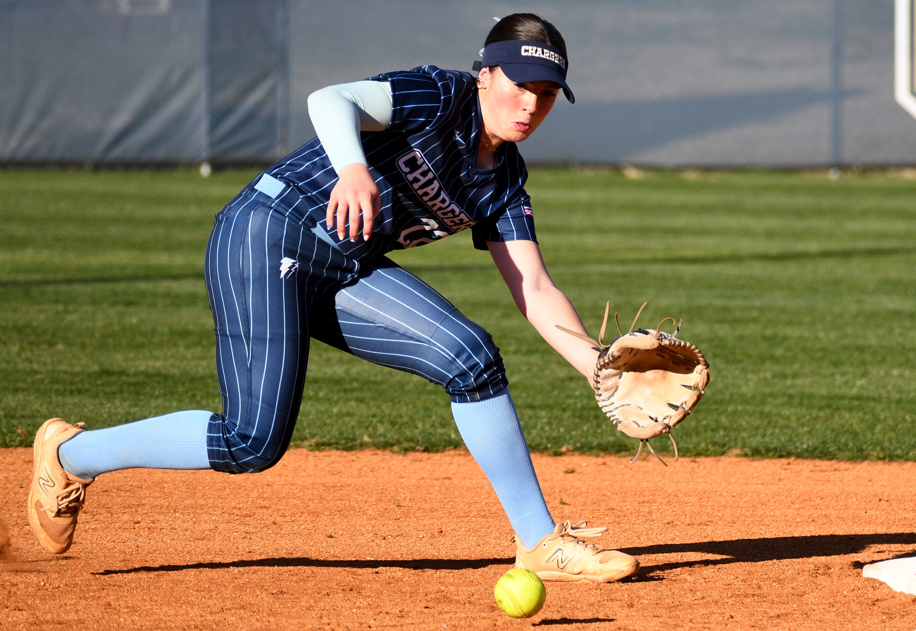 Staff Photo by Robin Rudd / Charger shortstop, Addi Lewis (22) runs down a ground ball. The Chattanooga Christian Chargers hosted the Silverdale Academy Seahawks in a TSSAA softball game on March 11, 2025.