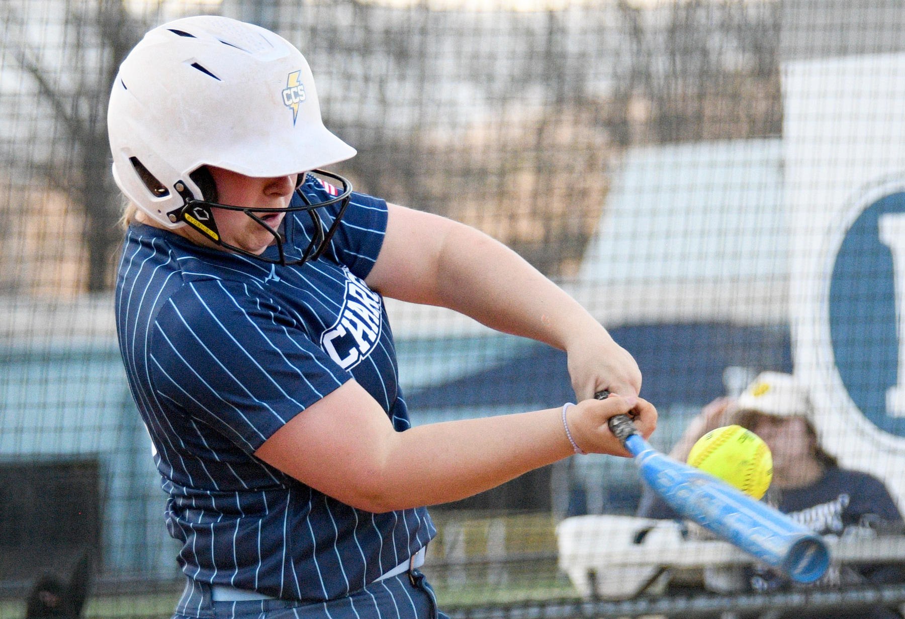Staff Photo by Robin Rudd / The bat bends as Chattanooga Christian's McKaine Layne (23) makes contact. The Chattanooga Christian Chargers hosted the Silverdale Academy Seahawks in a TSSAA softball game on March 11, 2025.