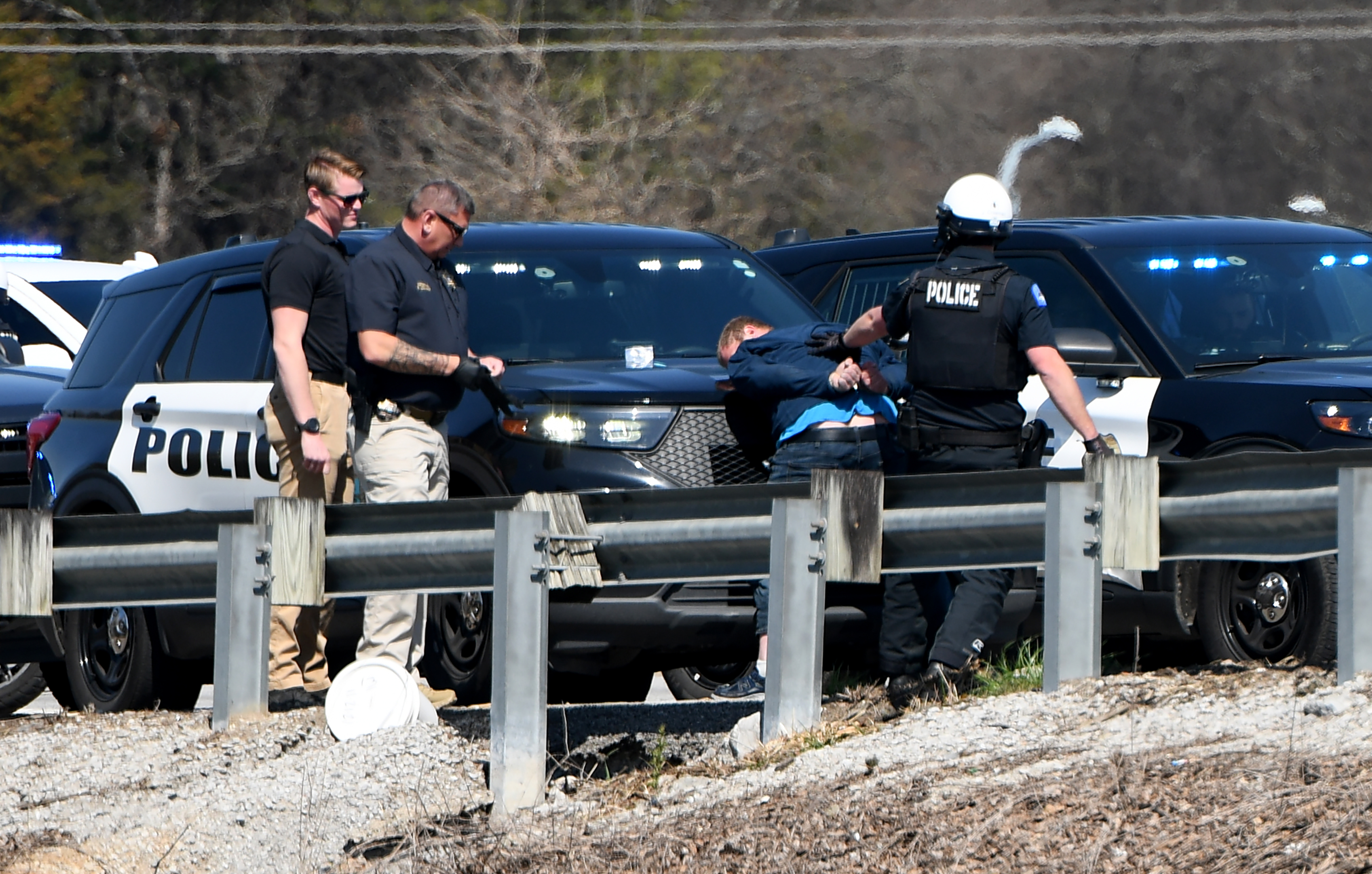 Staff photo by Abby White / Chattanooga police arrest Brett Ellis on March 12, 2025, after a police chase involving an EPB van on Highway 153. Ellis is charged with aggravated assault on police, reckless endangerment, reckless driving, auto theft and felony evading arrest.