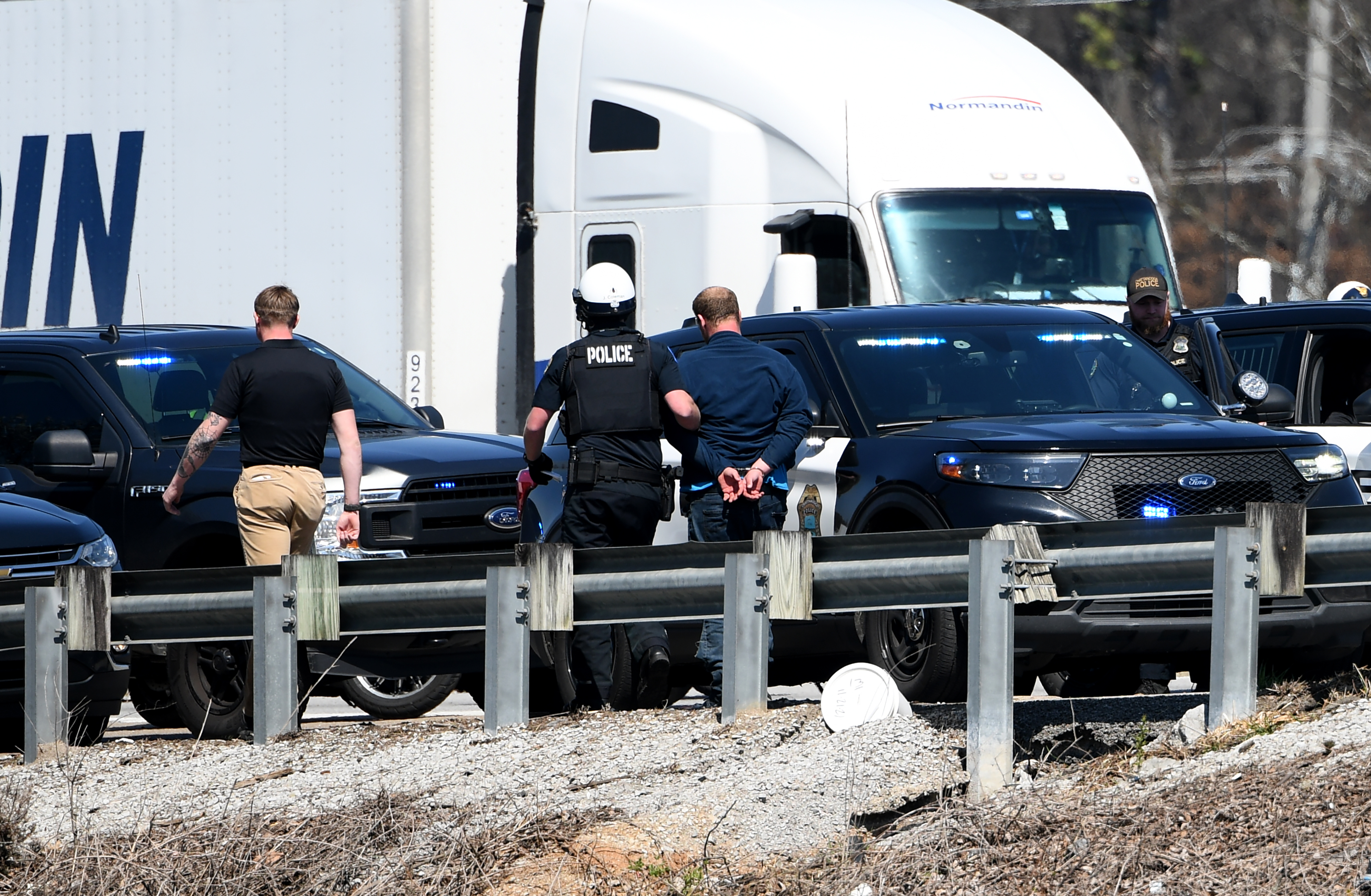 Staff photo by Abby White / Chattanooga police arrest Brett Ellis on March 12, 2025, after a police chase involving an EPB van on Highway 153. Ellis is charged with aggravated assault on police, reckless endangerment, reckless driving, auto theft and felony evading arrest.