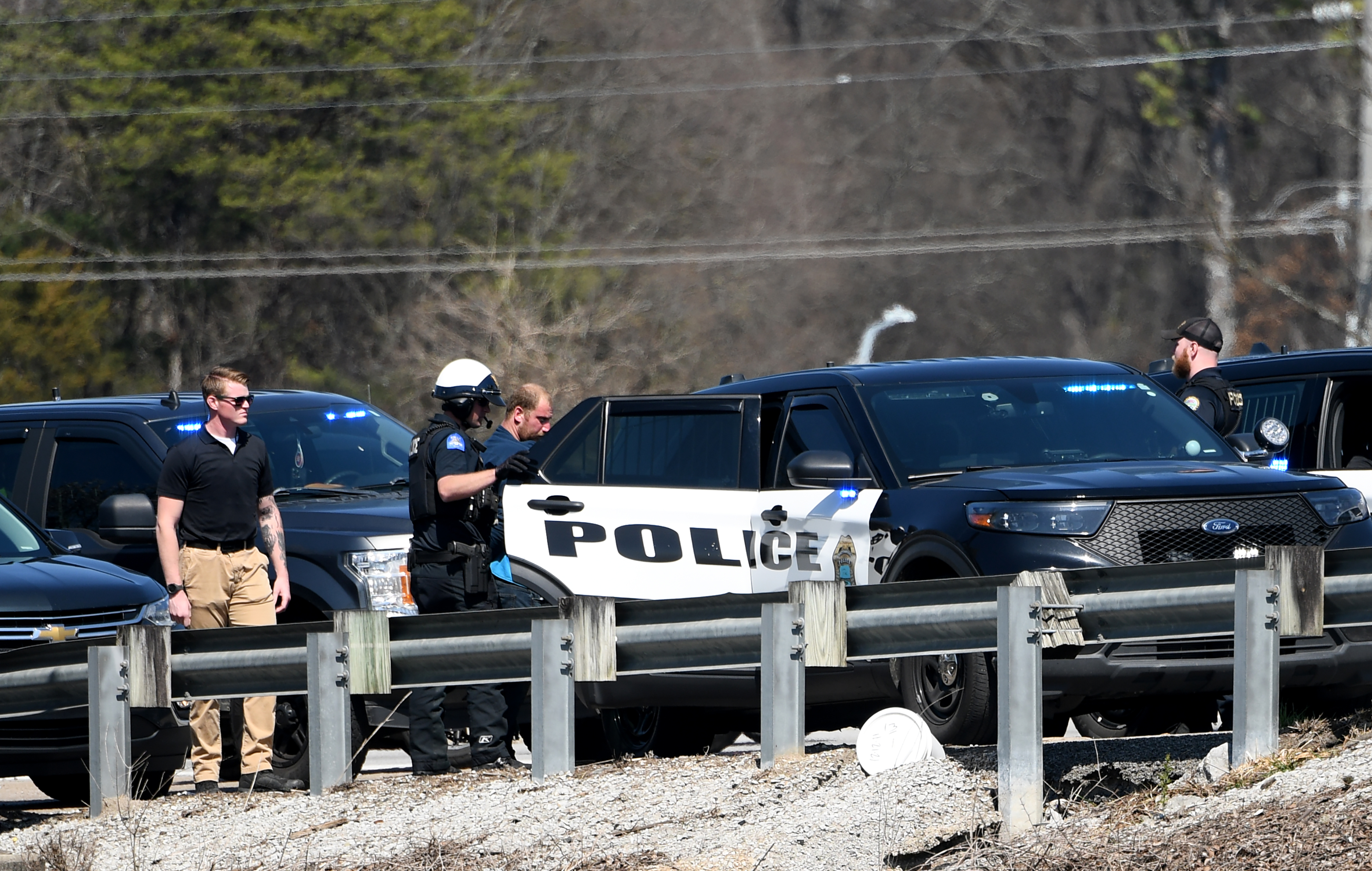Staff photo by Abby White / Chattanooga police arrest Brett Ellis on March 12, 2025, after a police chase involving an EPB van on Highway 153. Ellis is charged with aggravated assault on police, reckless endangerment, reckless driving, auto theft and felony evading arrest.