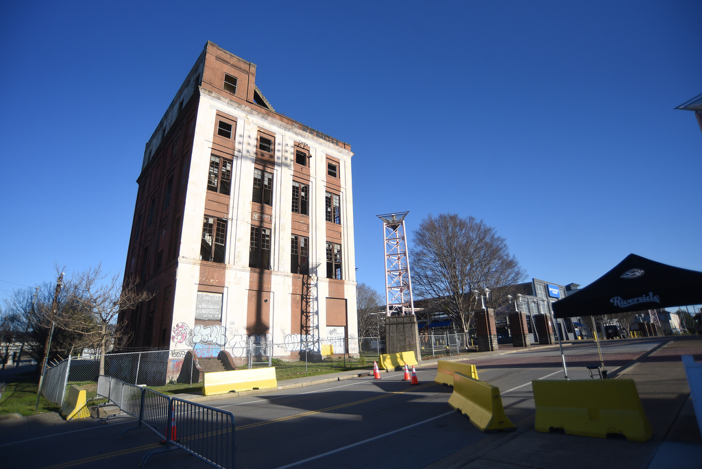 Staff photo by Matt Hamilton / The vacant Parkway Towers building is seen March 21, 2025, across from Finley Stadium. A developer wants to demolish the 100-year-old building and put up residences and commercial space, according to a filing with Chattanooga planners.