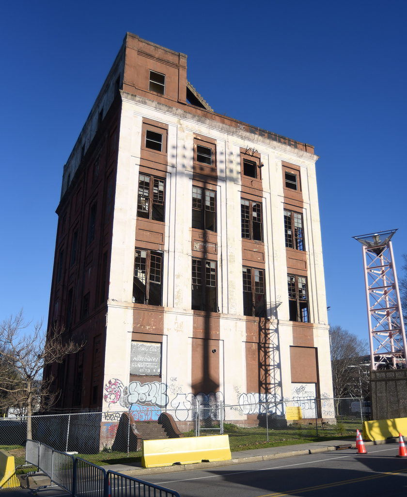 Staff photo by Matt Hamilton / The vacant Parkway Towers building is seen March 21, 2025, across from Finley Stadium. A developer wants to demolish the 100-year-old building and put up residences and commercial space, according to a filing with Chattanooga planners.