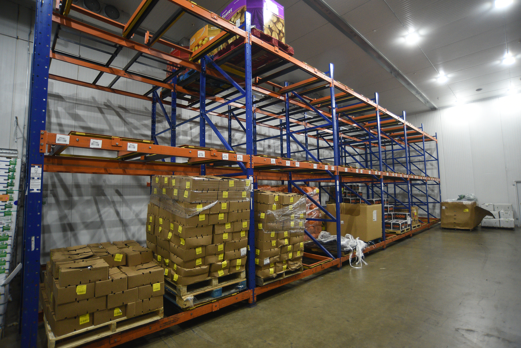 Staff photo by Matt Hamilton/ Shelves sit empty in the refrigerated area at the Chattanooga Area Food Bank on Friday, April 4, 2025.