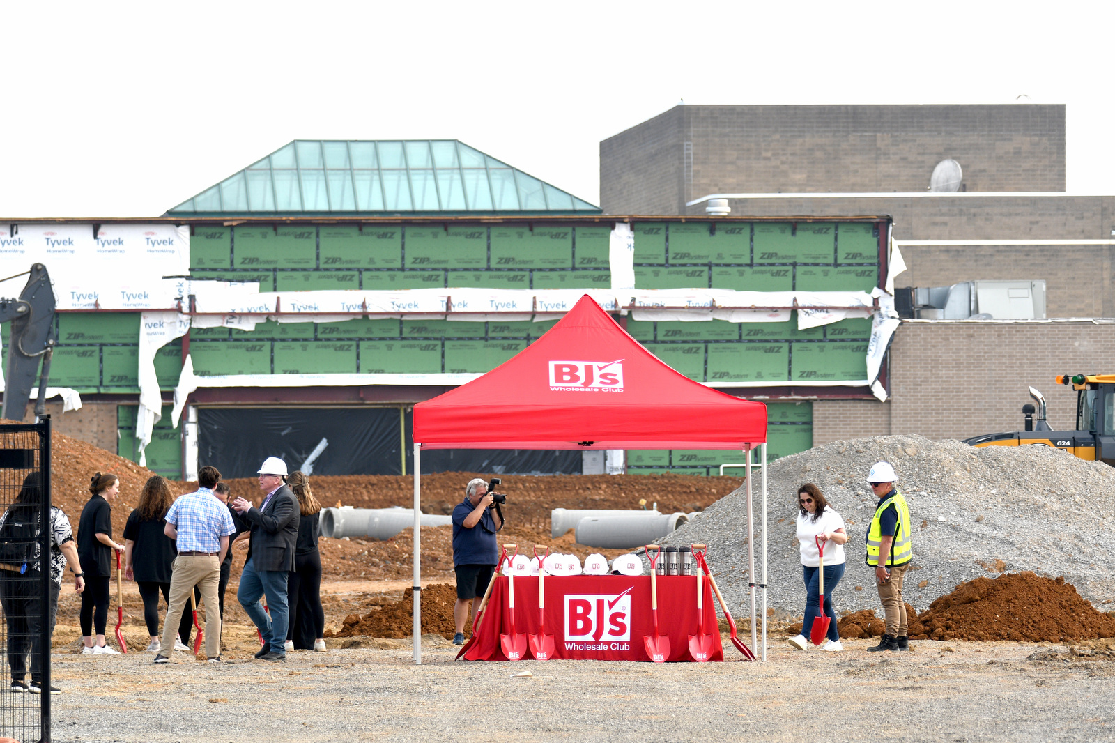 Staff Photo by Robin Rudd / The remainder of Northgate Mall looms in the background as the groundbreaking ceremony nears. BJ's Wholesale Club broke ground April 30, 2025, for its new location in Chattanooga at the former Sears at Northgate Mall.