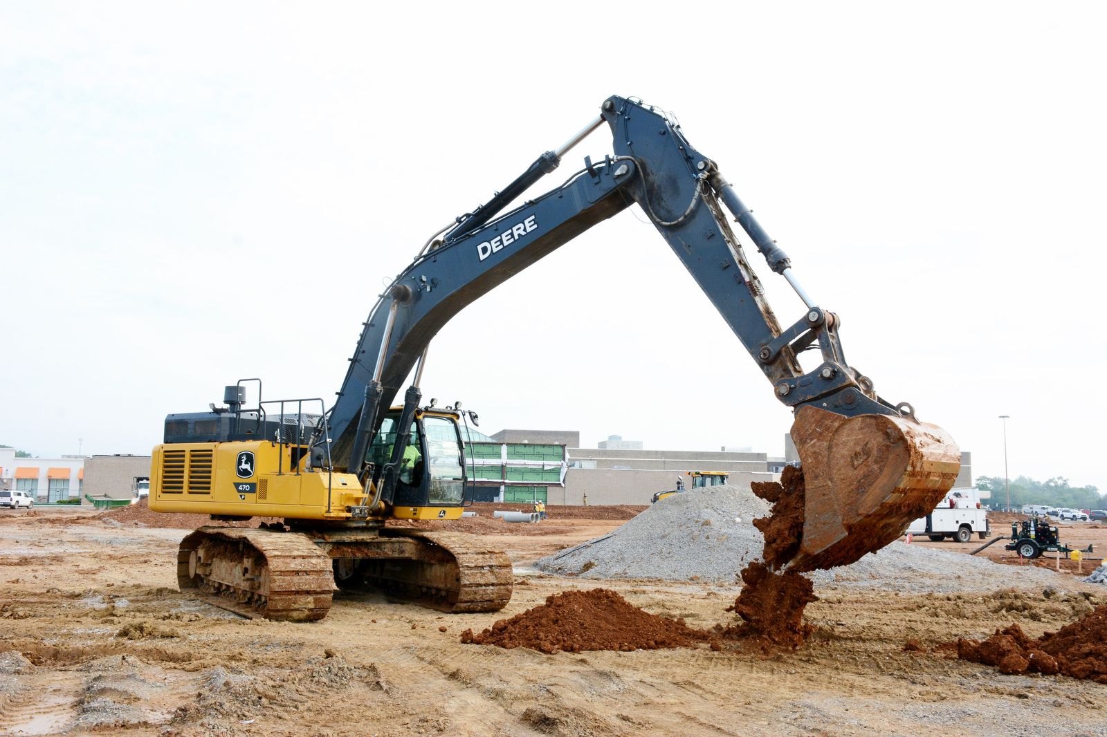 Staff Photo by Robin Rudd / EMJ Construction equipment moves the earth for the groundbreaking. BJ's Wholesale Club broke ground April 30, 2025, for its new location in Chattanooga at the former Sears at Northgate Mall.