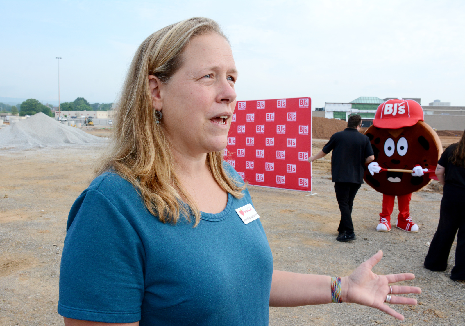 Staff Photo by Robin Rudd / Chattanooga Food Bank Chief Communications Officer Jeannie Carpenter discusses how BJ's Wholesale Club will help the local charity. BJ's Wholesale Club broke ground April 30, 2025, for its new location in Chattanooga at the former Sears at Northgate Mall.