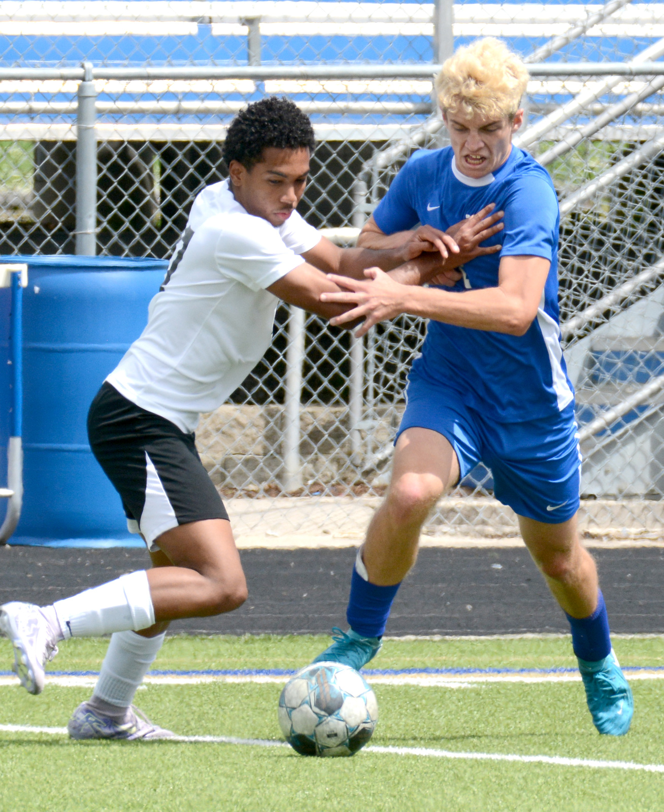 Staff Photo by Robin Rudd / Ringgolds Will Burgess (16) fightrs for control of the ball with a Shaw player. Ringgold hosted Shaw in the GHSA boys state soccer tournament on May 5, 2025.