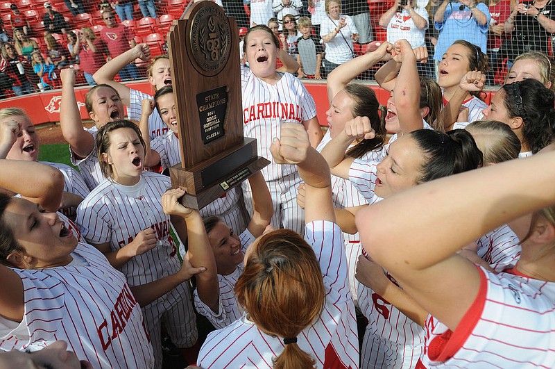 Staff Photo ANTHONY REYES
The Farmington Lady Cardinals celebrate their win against Ashdown in the 4A state championship Saturday May 21, 2011 at Bogle Park in Fayetteville. Farmington had to get one out against Ashdown to win in a game continued from the previous evening. Farmington pitcher Madison Barnes threw five pitches before Ashdown hit to Kendra Center at first base to record the final out in the Lady Cardinals 7-5 win. The 2011 softball championship season is one of the top stories of the decade: 2010-2019 at Farmington.