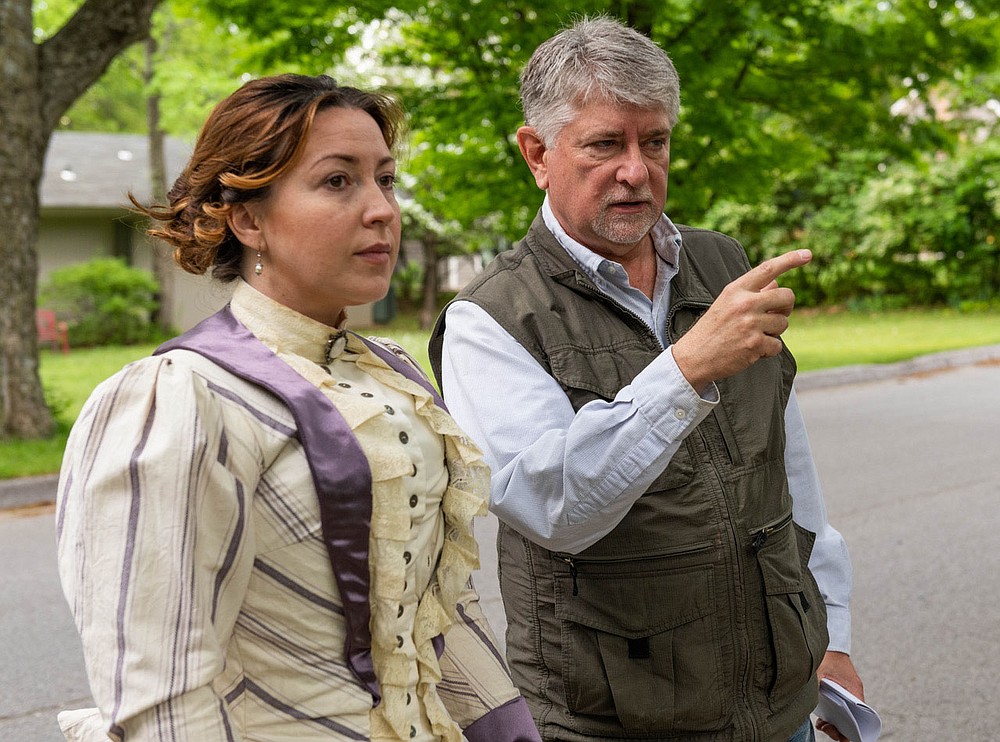 Filmmaker Larry Foley directs Jennica Schwartzman in a scene from "Indians, Outlaws, Marshals and the Hangin’ Judge" shot in Fayetteville.
(Courtesy Photo/James Brewer)