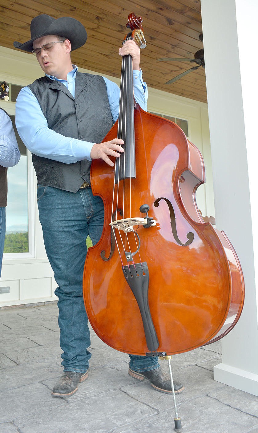Graham Thomas/Herald-Leader
Dillon Butler sings bass and plays the upright bass, which is affectionately known as "Lil Sebastian" for The Butler Creek Boys.