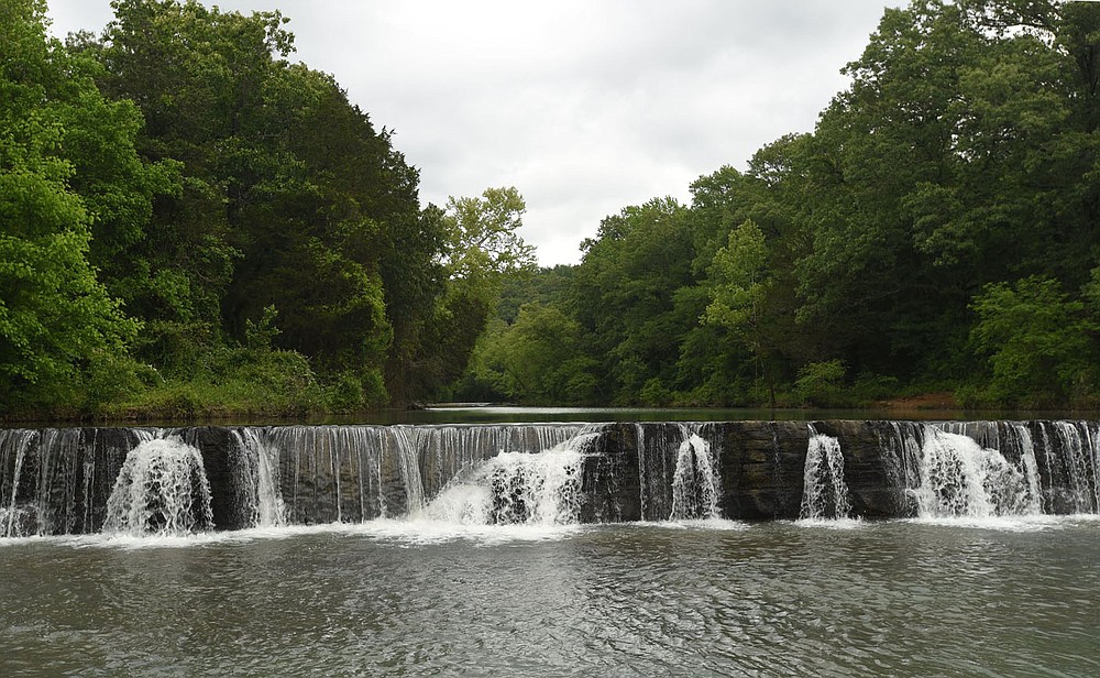 Natural Dam waterfall appears to be totally man-made, but it it totally natural.
(NWA Democrat-Gazette/Flip Putthoff)