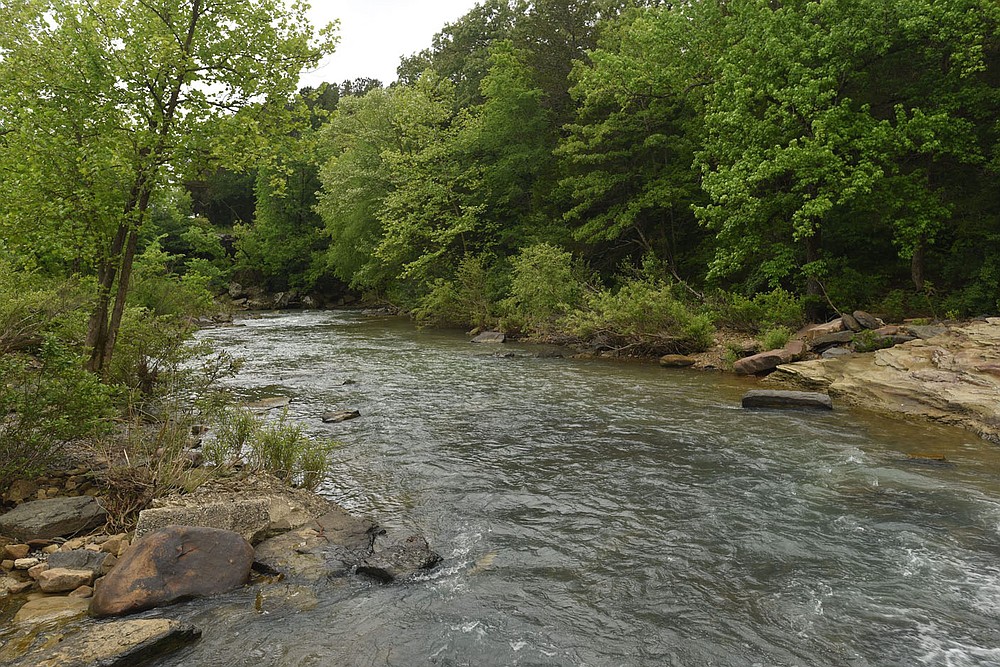 Mountain Fork Creek in Crawford County creates the beautiful waterfall at Natural Dam.
(NWA Democrat-Gazette/Flip Putthoff)