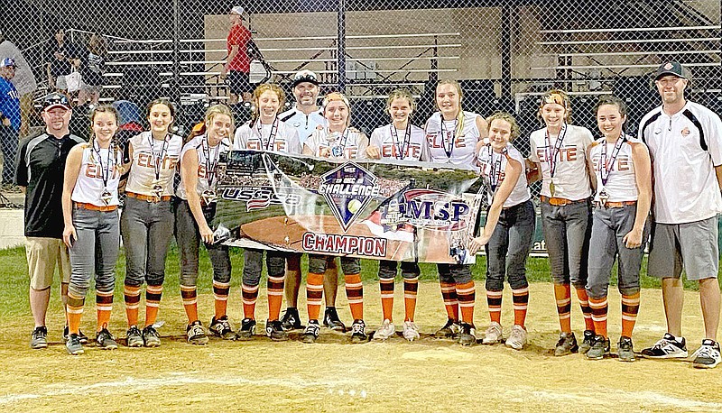 Submitted photo/Brinkley Moreton (center next to coach) celebrates winning the Oklahoma City Challenge Softball tournament May 31 as a member of the Tulsa Elite NWA 06 traveling softball team. Brinkley alternates with two others as pitchers on the team. She is a rising eighth-grader at Lincoln Junior High.