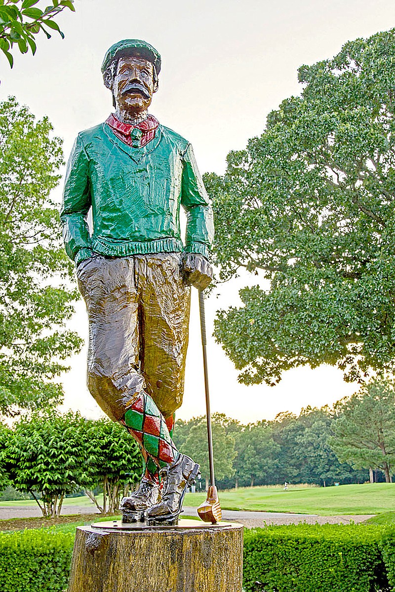 Jan Halgrim/Bella Vista Photography Club
A hand carved Mr. Mulligan welcomes golfers to the Highlands Club House in Bella Vista.