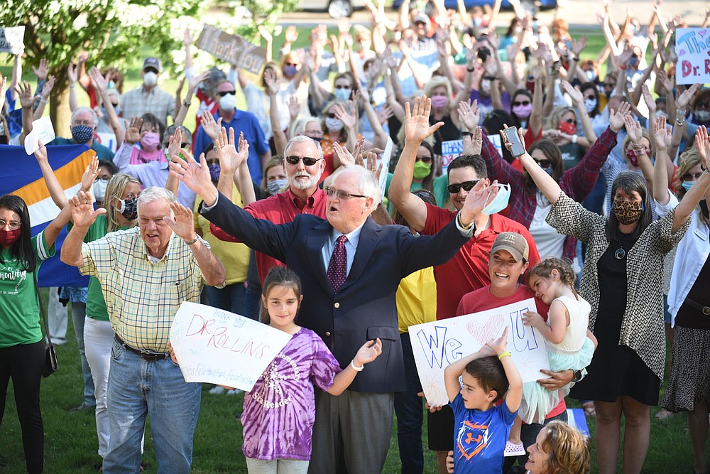 Jim Rollins, superintendent for Springdale Public Schools, stands with his family and teachers, faculty and well wishers, Tuesday, June 9, 2020, following his last school board meeting in Springdale. Rollins had served as the superintendent for Springdale Public Schools for the last 38 years and has accepted the position as the President of the Northwest Arkansas Technical Institute in Springdale. Visit nwaonline.com/200610Daily/ and nwadg.com/photos for a photo gallery.
(NWA Democrat-Gazette/David Gottschalk)