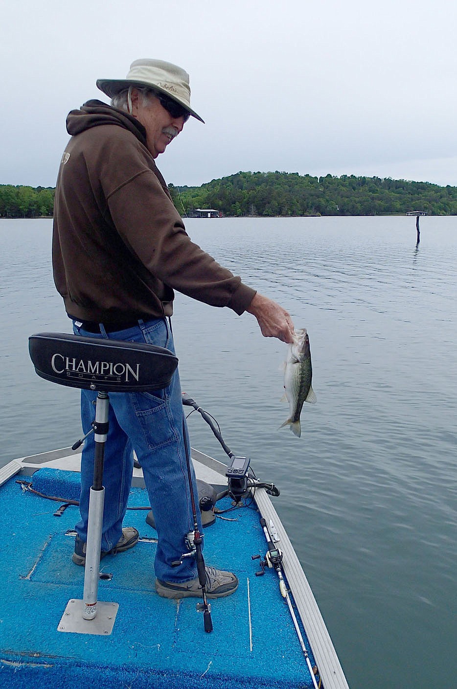 Culmer catches a spotted bass that bit his plastic worm along ledge rock.
(NWA Democrat-Gazette/Flip Putthoff)