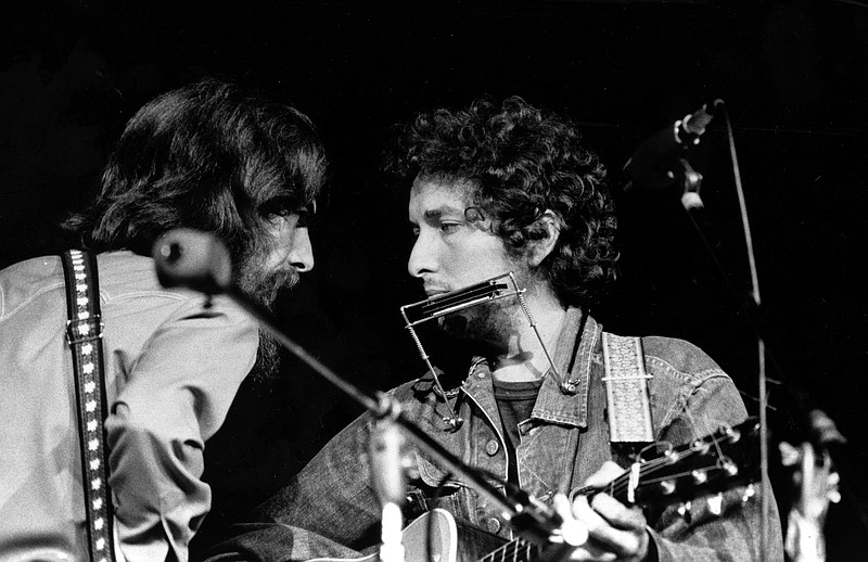 George Harrison (left) and Bob Dylan performed during a benefit concert at Madison Square Garden in New York in 1971.

(AP)