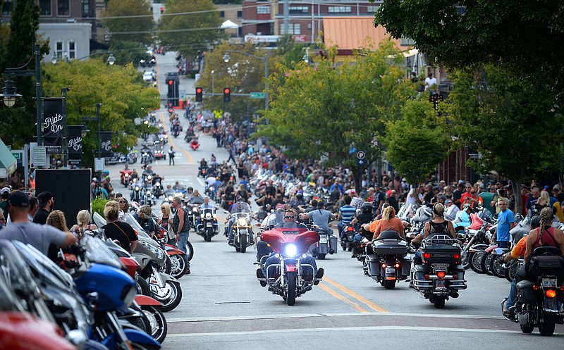 NWA Democrat-Gazette/ANDY SHUPE
Motorcyclists ride Saturday, Sept. 28, 2019, along Dickson Street during the 20th annual Bikes, Blues & BBQ Motorcycle Rally in Fayetteville. Visit nwadg.com/photos to see more photographs from the rally.