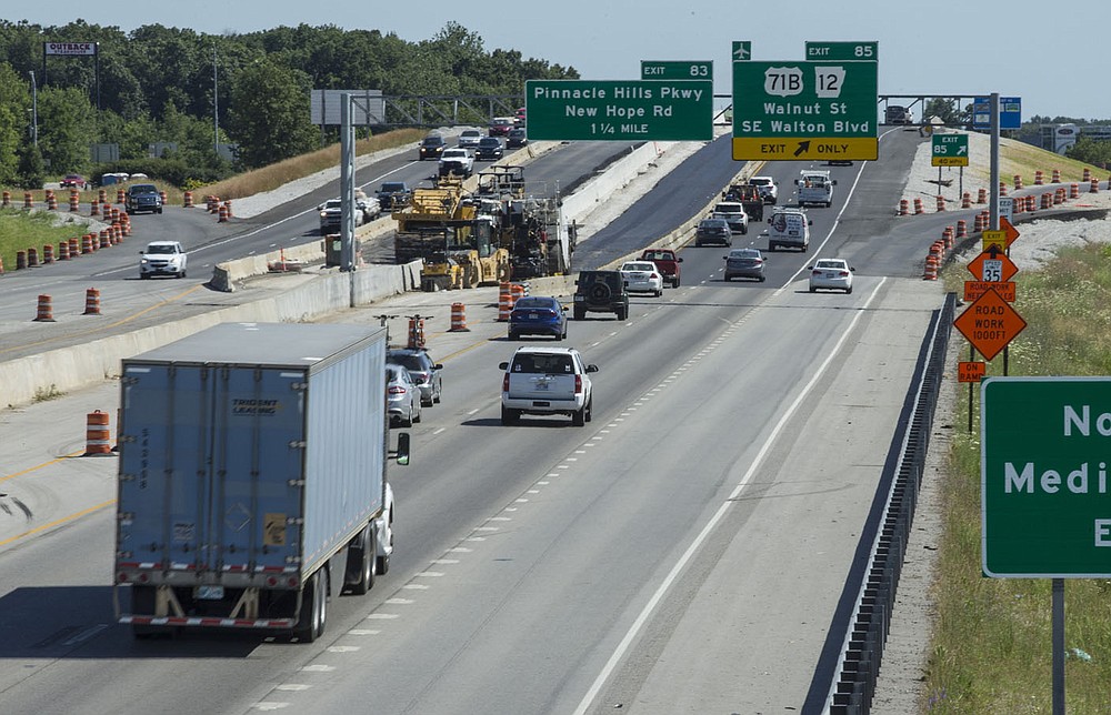 Traffic moves along Interstate 49 Thursday, June 11, 2020, on as construction continues on the new exit for West Walnut Street in Rogers. Go to nwaonline.com/200612Daily to see more photos.
(NWA Democrat-Gazette/Ben Goff)