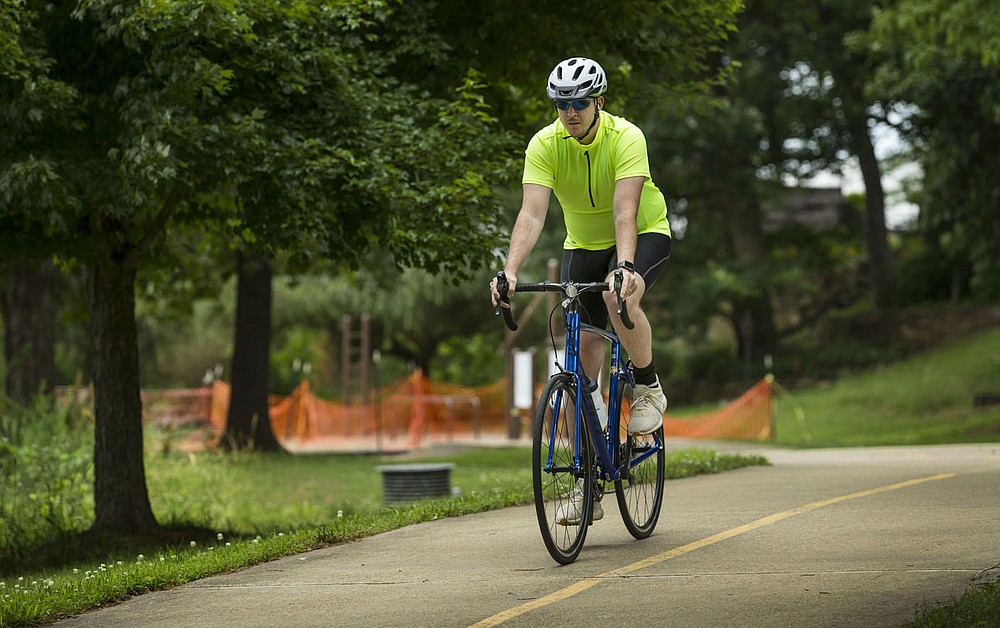 Max Grubb of Rogers starts his ride Wednesday, June 10, 2020, on the Razorback Regional Greenway to Fayetteville from Horsebarn Trailhead Park in Rogers. Go to nwaonline.com/200612Daily to see more photos.
(NWA Democrat-Gazette/Ben Goff)