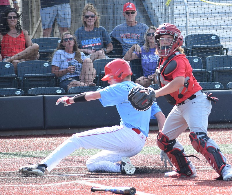 RICK PECK/SPECIAL TO MCDONALD COUNTY PRESS McDonald County catcher Jakob Gordon prepares to throw to first after forcing out a Webb City runner at the plate in the McDonald County 16U baseball team's 22-16 loss in an 8-on-8 league game on June 9 at Joe Becker Stadium in Joplin.