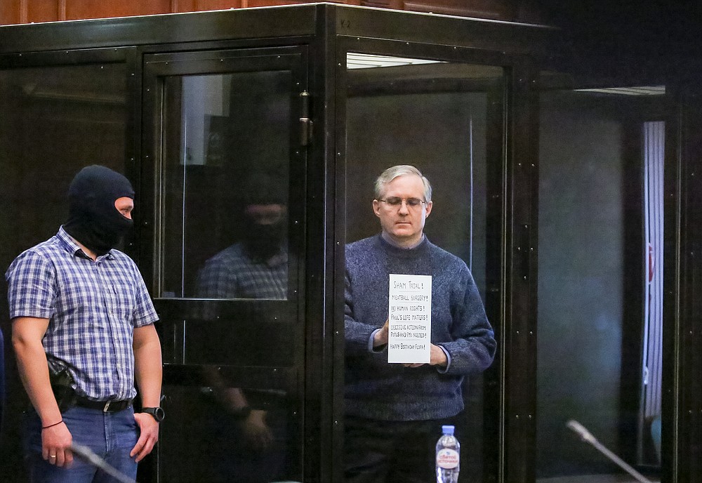 Paul Whelan, a former U.S. marine who was arrested for alleged spying, listens to the verdict in a courtroom at the Moscow City Court in Moscow, Russia, Monday, June 15, 2020. The Moscow City Court on Monday convicted Paul Whelan on charges of espionage and sentenced him to 16 years in maximum security prison colony. Whelan has insisted on his innocence, saying he was set up. The U.S. Embassy has denounced Whelan's trial as unfair, pointing that no evidence has been provided. (Sofia Sandurskaya, Moscow News Agency photo via AP)