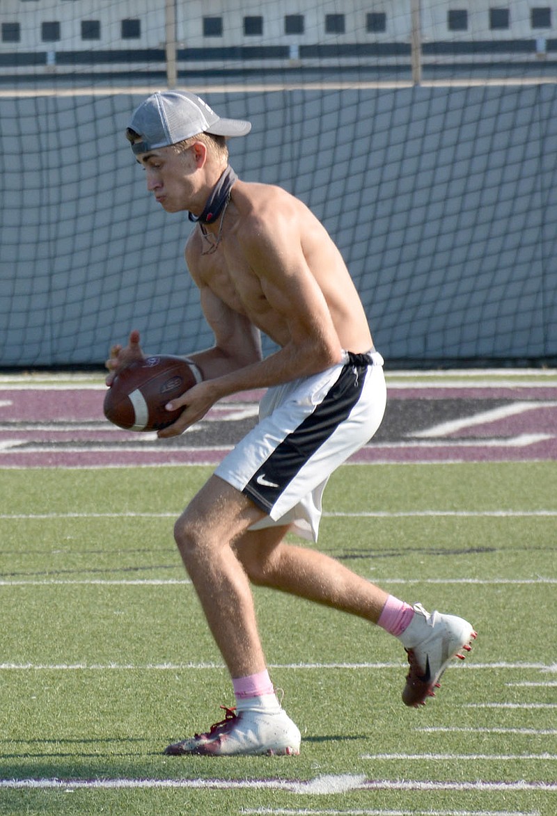 Graham Thomas/Herald-Leader
Siloam Springs senior wide receiver Gavin Henson hauls in a pass during football practice last week at Panther Stadium.