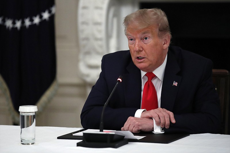 FILE — President Donald Trump speaks during a roundtable with governors on the reopening of America's small businesses, in the State Dining Room of the White House in Washington in this June 18, 2020, file photo. (AP Photo/Alex Brandon)
