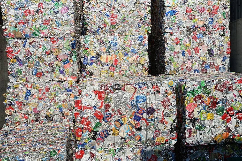 Bales of aluminum cans are stacked Friday, June 19, 2020, at the city of Fayetteville's Recycling and Trash Collection Division facility. Recycling collection during suspension of the curbside program was about 79% of what it was from March to June last year. The city’s curbside service resumes Monday.Visit nwaonline.com/200621Daily/ for today's photo gallery.
(NWA Democrat-Gazette/Andy Shupe)