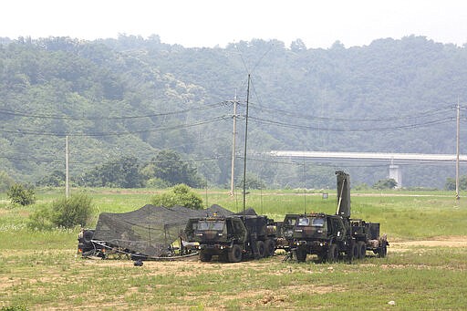 U.S. Army mobile equipment sits in a field in Yeoncheon, South Korea, near the border with North Korea, Wednesday, June 17, 2020. North Korea said Wednesday it will redeploy troops to now-shuttered inter-Korean cooperation sites, reinstall guard posts and resume military exercises at front-line areas, nullifying the tension-reducing deals reached with South Korea just two years ago. (AP Photo/Ahn Young-joon)