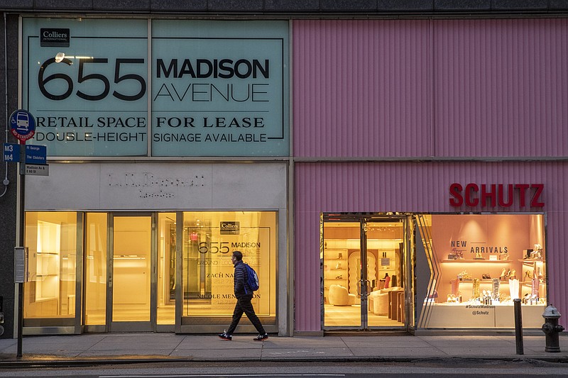 In this Thursday, March 19, 2020, file photo, a pedestrian walks past a storefront for rent on Madison Avenue, in New York. The coronavirus has had an impact on the commercial real estate markets. - File AP Photo/Mary Altaffer