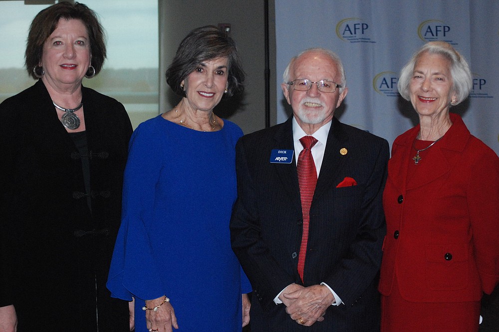 NWA Democrat-Gazette/JOCELYN MURPHY Karen Parker (from left), Nancy and Dick Trammel and Betsy Phillips visit at the luncheon. Dick was presented the Lifetime Achievement award and Betsy the Judges Special Award.