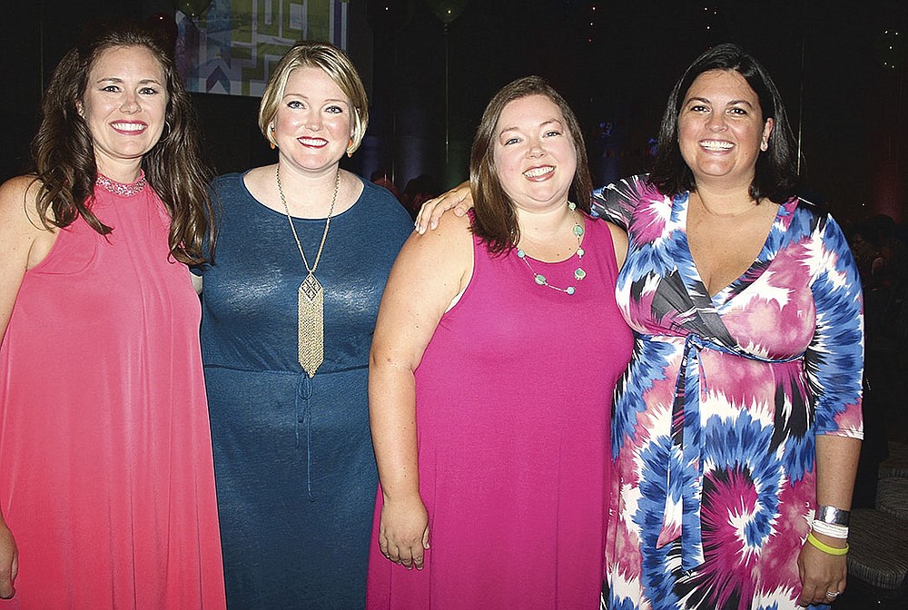 NWA Democrat-Gazette/CARIN SCHOPPMEYER Karie Watson (from left), Emily Fourney, Kelli Caudle and K.C. Tucker help out at Summer Salsa.