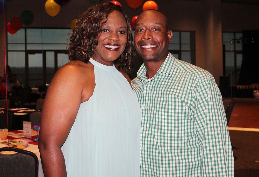 NWA Democrat-Gazette/CARIN SCHOPPMEYER Jessica and Ron Johnson enjoy Summer Salsa.