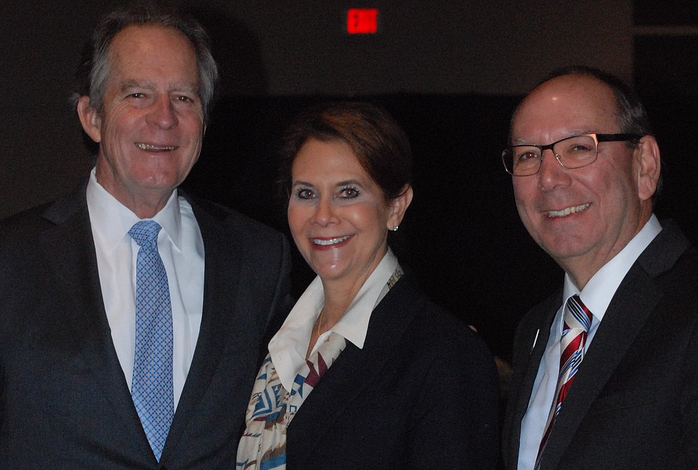 NWA Democrat-Gazette/JOCELYN MURPHY Neal and Gina Pendergraft, Outstanding Philanthropist honorees, talk with Fred Hueston on National Philanthropy Day.