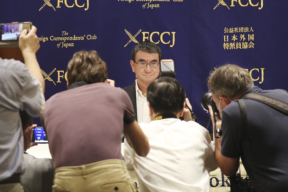 Japanese Defense Minister Taro Kono attends a press conference in Tokyo, Thursday, June 25, 2020. Japan's National Security Council has endorsed plans to cancel the deployment of two costly land-based U.S. missile defense systems aimed at bolstering the country’s capability against threats from North Korea, Kono said Thursday. (AP Photo/Koji Sasahara)
