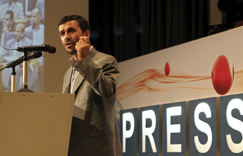 In this July 2, 2007, file photo, the then President Mahmoud Ahmadinejad delivers his speech during inauguration ceremony for Iran's first English-language channel, Press TV, as its logo is seen in background, in Tehran, Iran. - AP Photo/Vahid Salemi