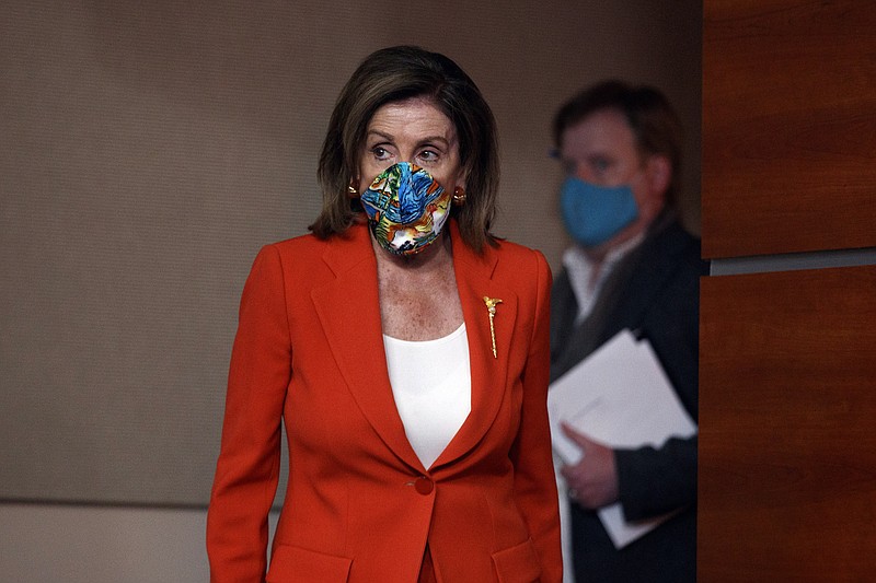 House Speaker Nancy Pelosi of Calif., wears a face mask as she arrives to speak at a news conference on Capitol Hill in Washington, Friday, June 26, 2020. (AP Photo/Carolyn Kaster) story.lead_photo.caption