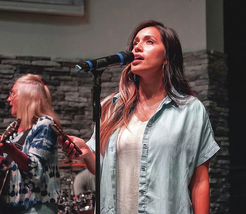 Singer Desi Chittum rehearses with the Gospel Light praise and worship band on June 26, 2020.-Photo by Cassidy Kendall of The Sentinel-Record