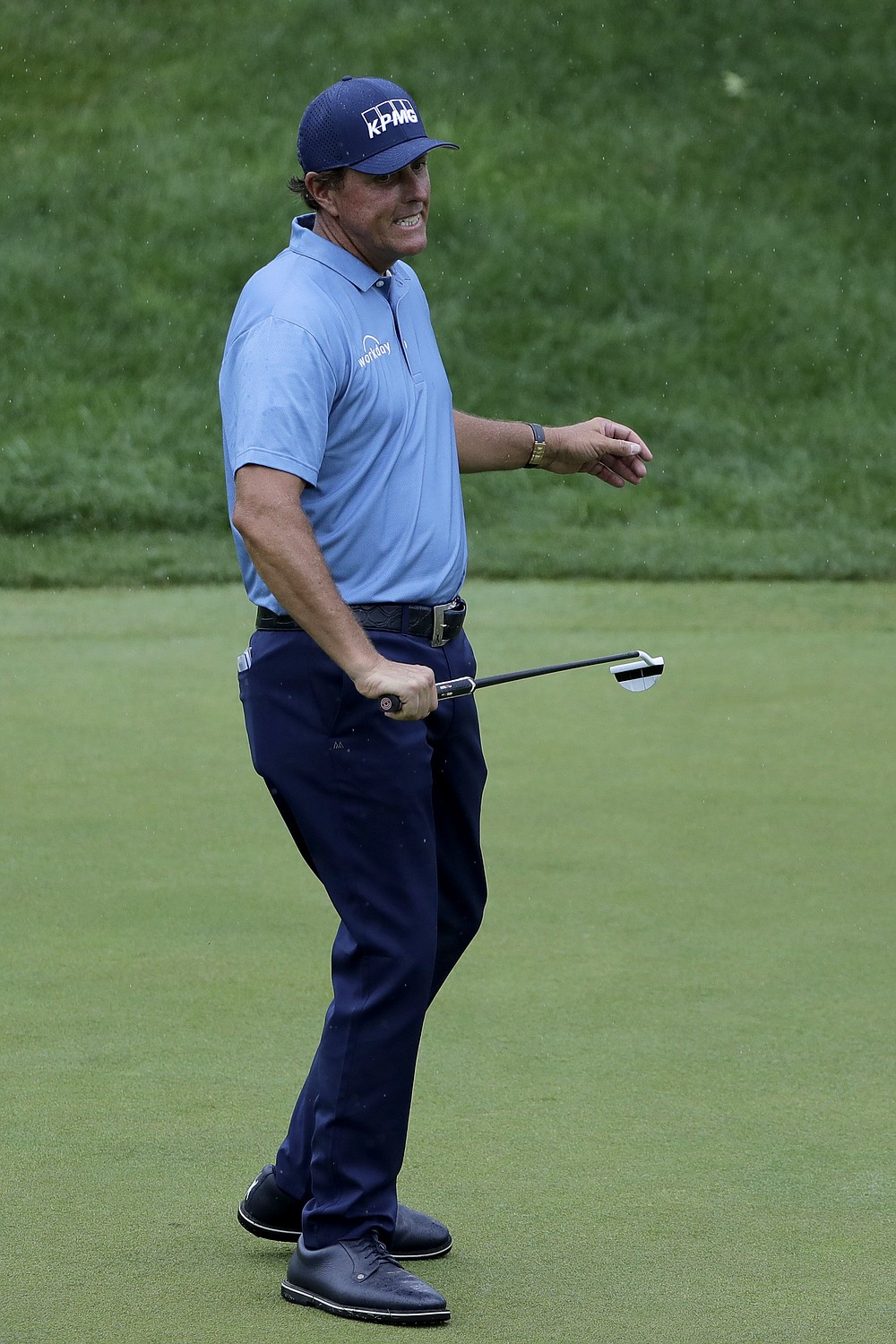 Phil Mickelson reacts after missing a putt on the 18th green during the third round of the Travelers Championship golf tournament at TPC River Highlands, Saturday, June 27, 2020, in Cromwell, Conn. (AP Photo/Frank Franklin II)