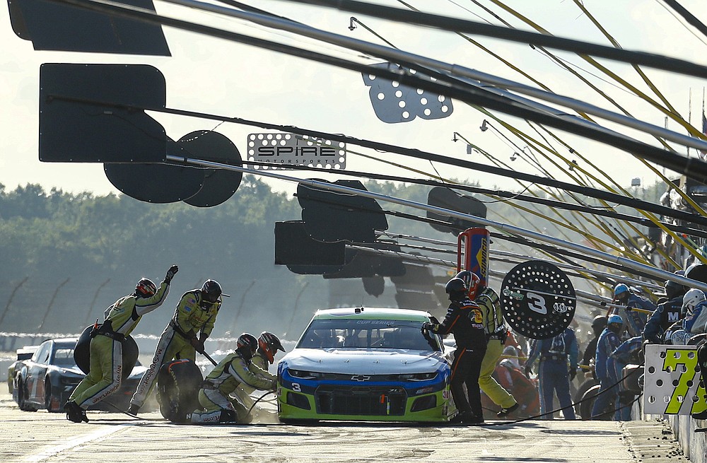 Austin Dillon makes a pit stop during the NASCAR Cup Series auto race at Pocono Raceway, Sunday, June 28, 2020, in Long Pond, Pa. (AP Photo/Matt Slocum)